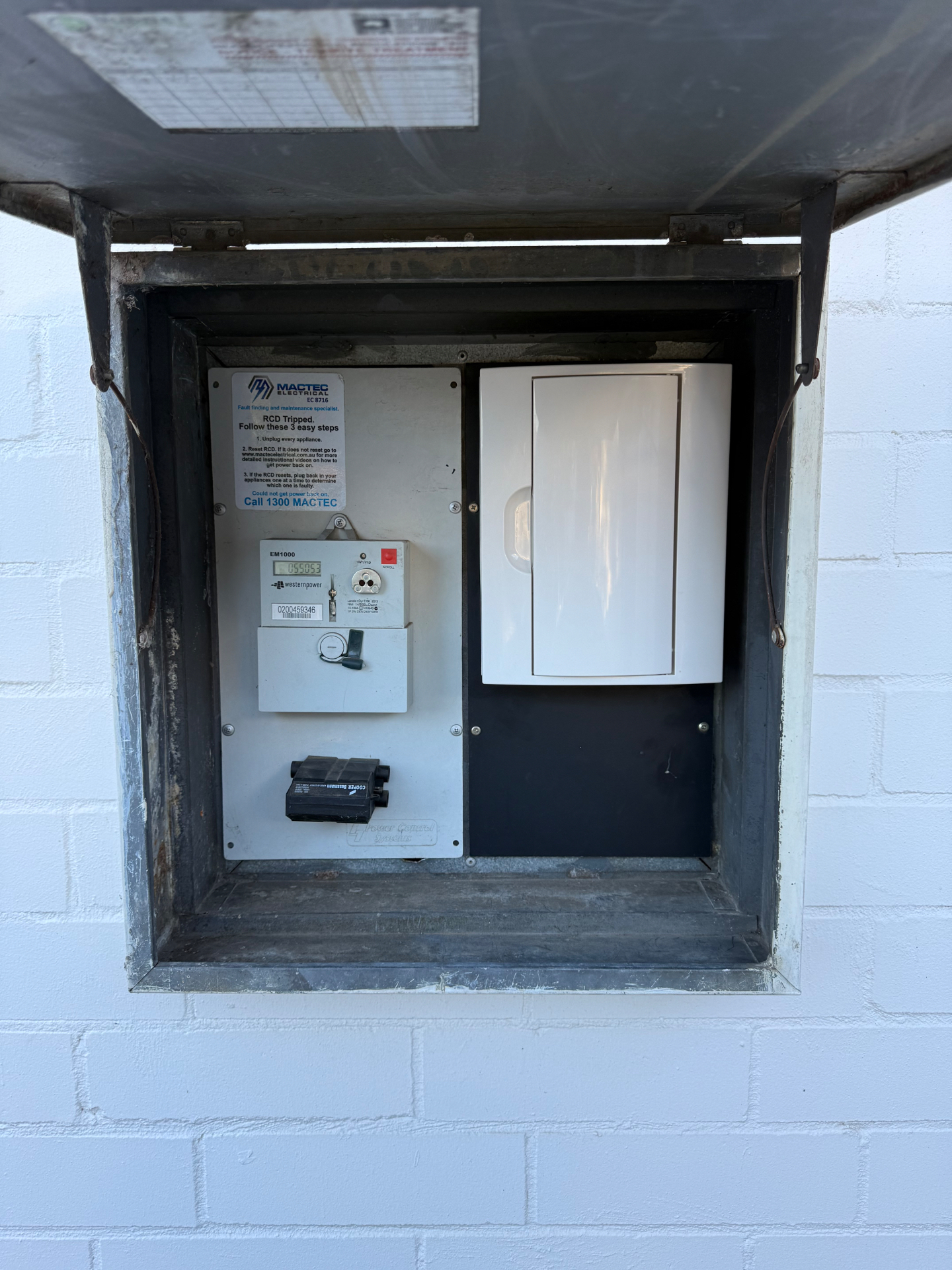 Meter box with Western Power meter and enclosed circuit breaker panel