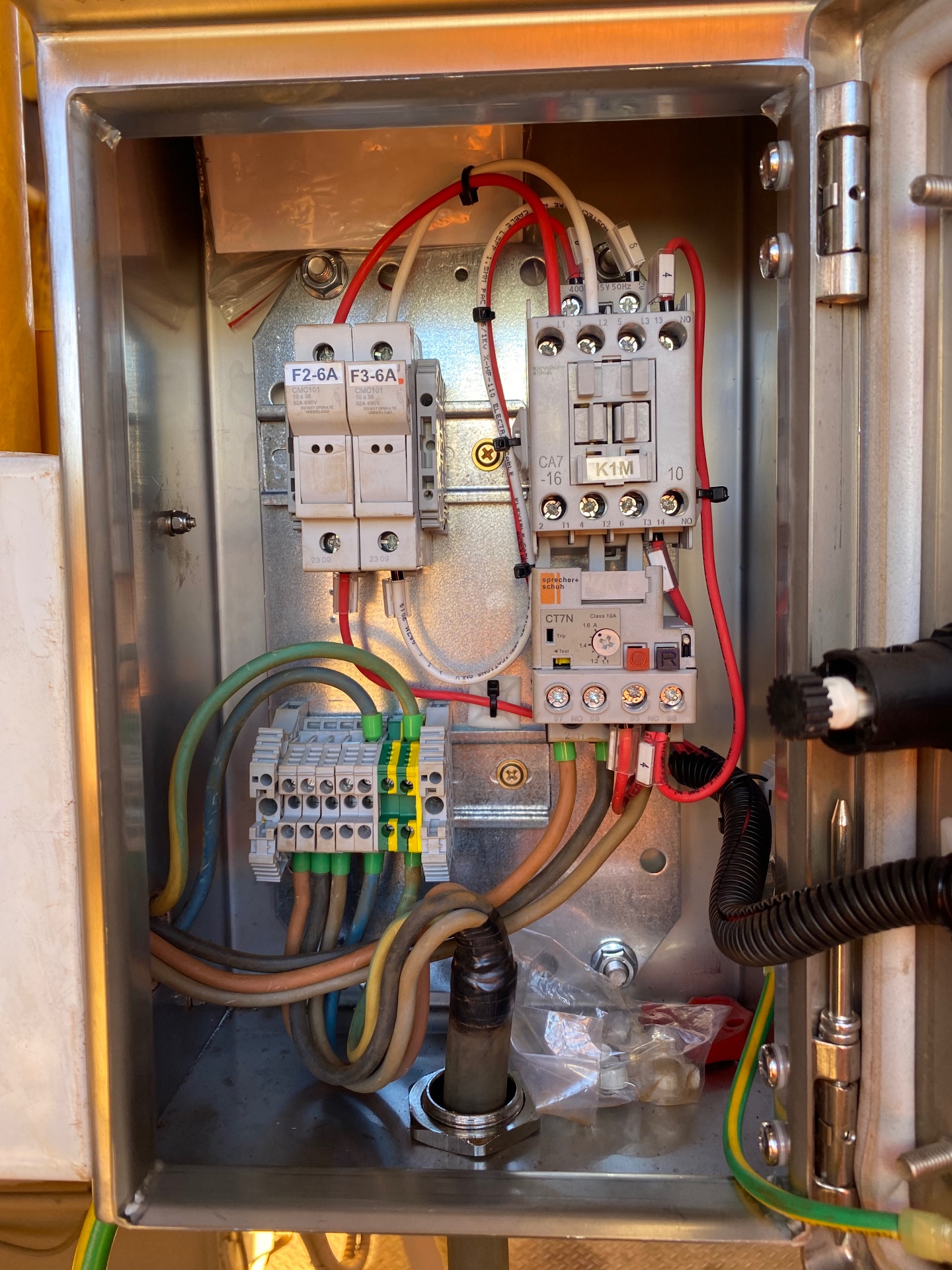 Stainless steel industrial control panel with contactor, overload relay and fused terminals